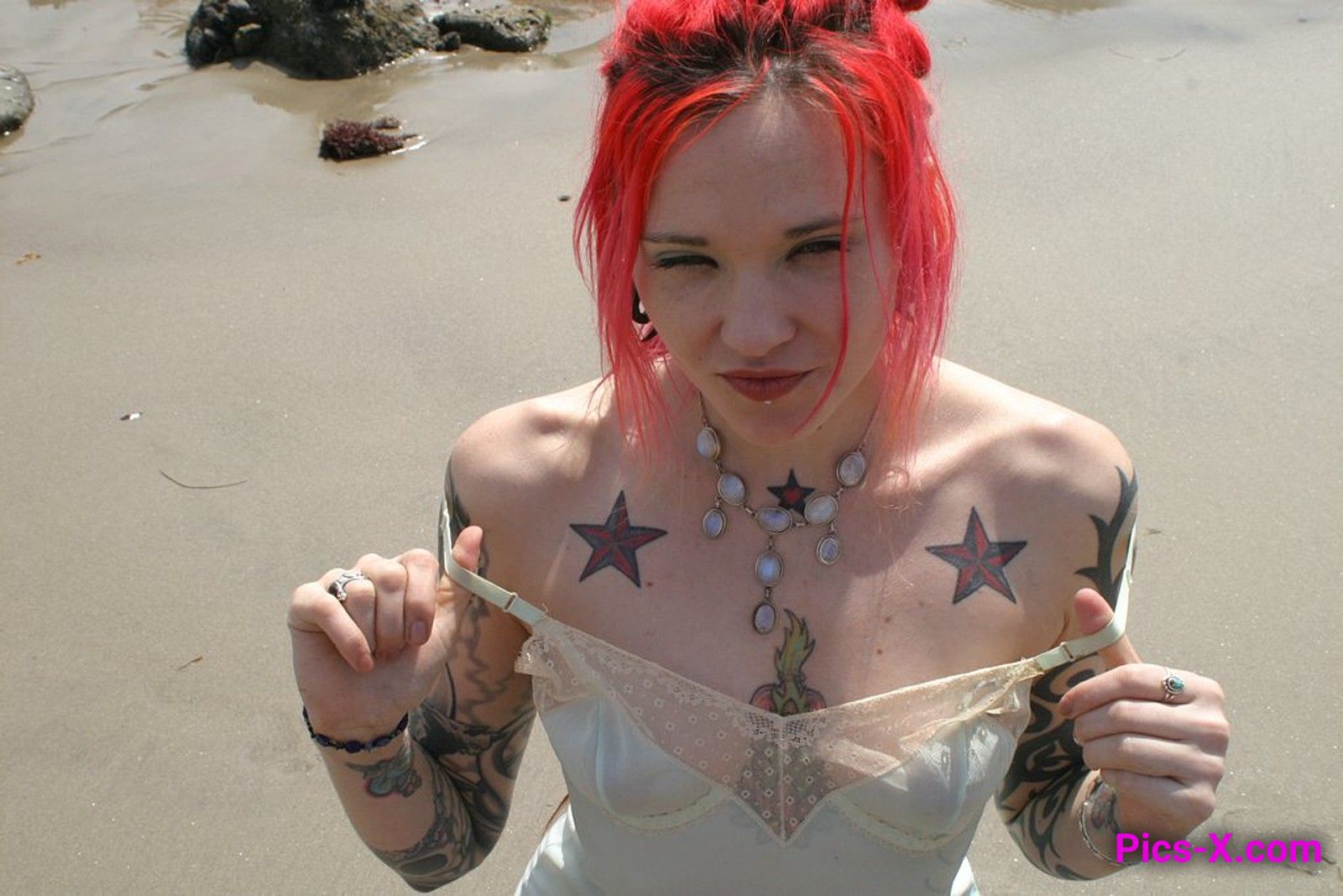 Inked up goth girl playing in the waves at a beach - Punk Rock Girlfriend - Image 12