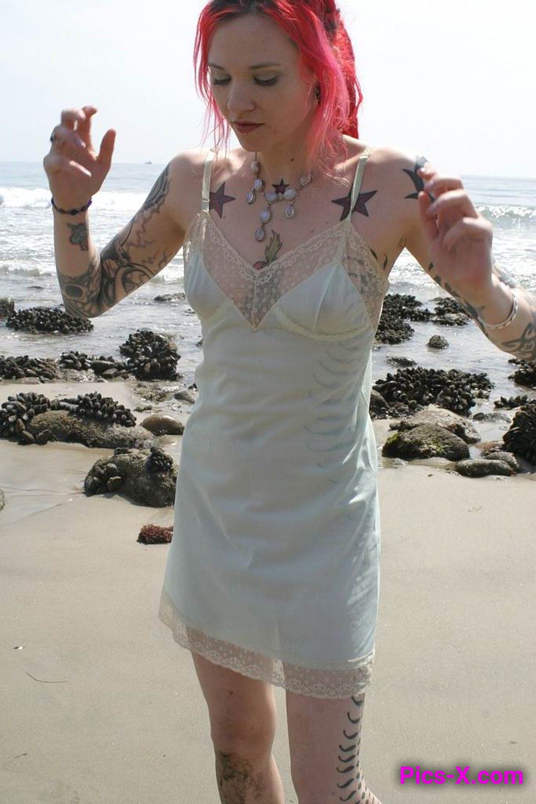 Inked up goth girl playing in the waves at a beach - Punk Rock Girlfriend - Image 16