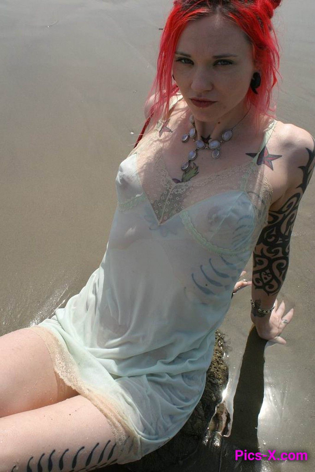 Inked up goth girl playing in the waves at a beach - Punk Rock Girlfriend - Image 21