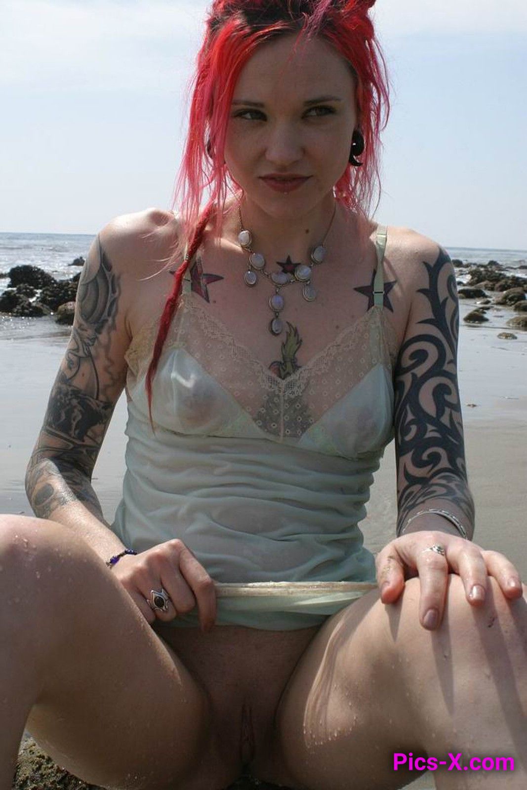 Inked up goth girl playing in the waves at a beach - Punk Rock Girlfriend - Image 24